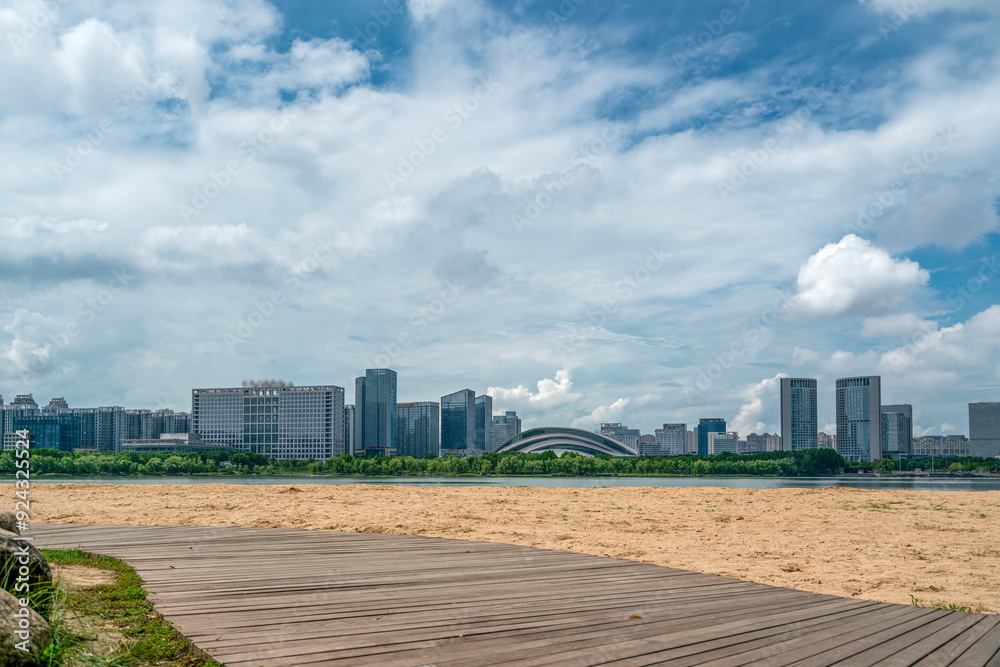 Serene Cityscape by the Waterfront Under a Clear Sky Serene Cityscape by the Waterfront Under a Clear Sky