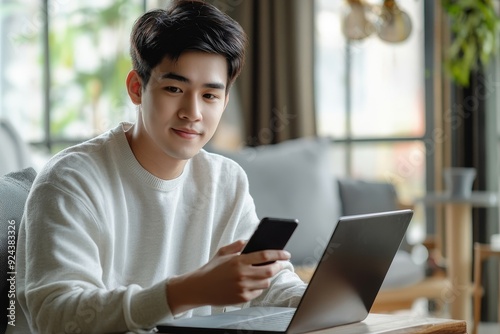 Close up of young asian business man using mobile phone surfing the internet, searching information during online working on laptop computer at home, Generative AI Free Download Close up of young asian business man using mobile phone surfing the internet, searching information during online working on laptop computer at home, Generative AI - GFXLoad