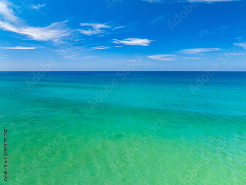 Beautiful sea beach and waves texture in sunny summer day background