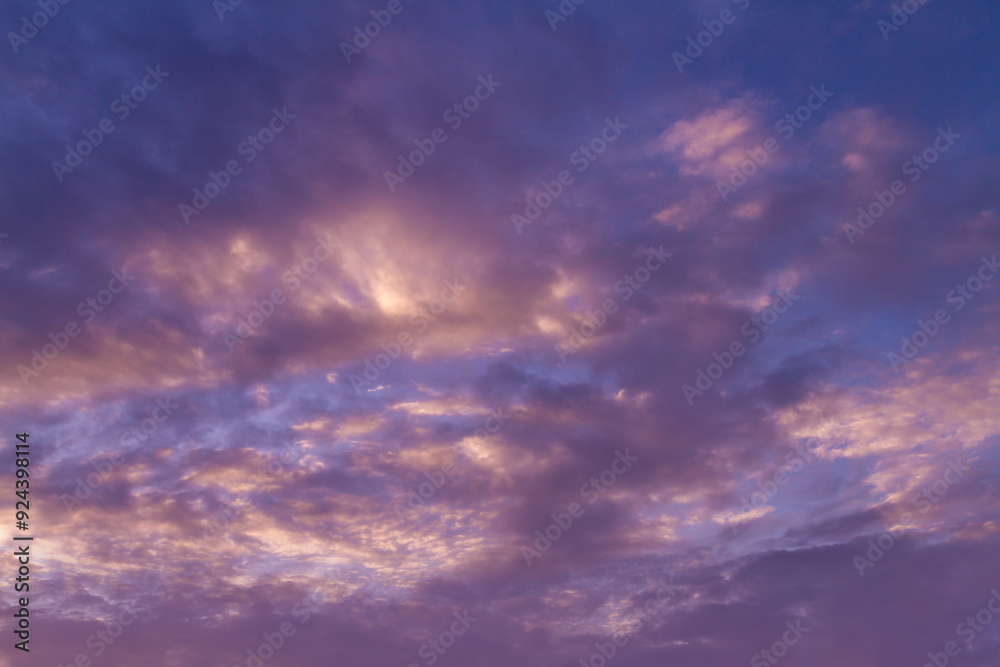 Beautiful colored on sky and group of small fluffy clouds in twilight time. Colorful background from outdoors natural sunset with copy space. Beautiful colored on sky and group of small fluffy clouds in twilight time. Colorful background from outdoors natural sunset with copy space.