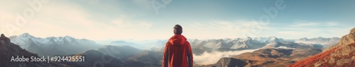 Exploring the Majestic Mountain Vista: A Person in a Red Jacket Embracing the Dawn, Symbolizing the Dawn of Artificial Intelligence and Discovery.