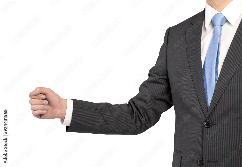 Businessman in a suit, closeup of clenched fist. white background. Concept of determination, professionalism, and business gesture Businessman in a suit, closeup of clenched fist. white background. Concept of determination, professionalism, and business gesture