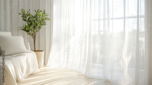 Sheer white curtains softly diffusing sunlight, creating a tranquil and airy ambiance in the room.