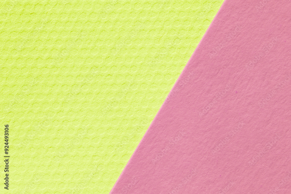 close up of green and purple sheets of cardboard