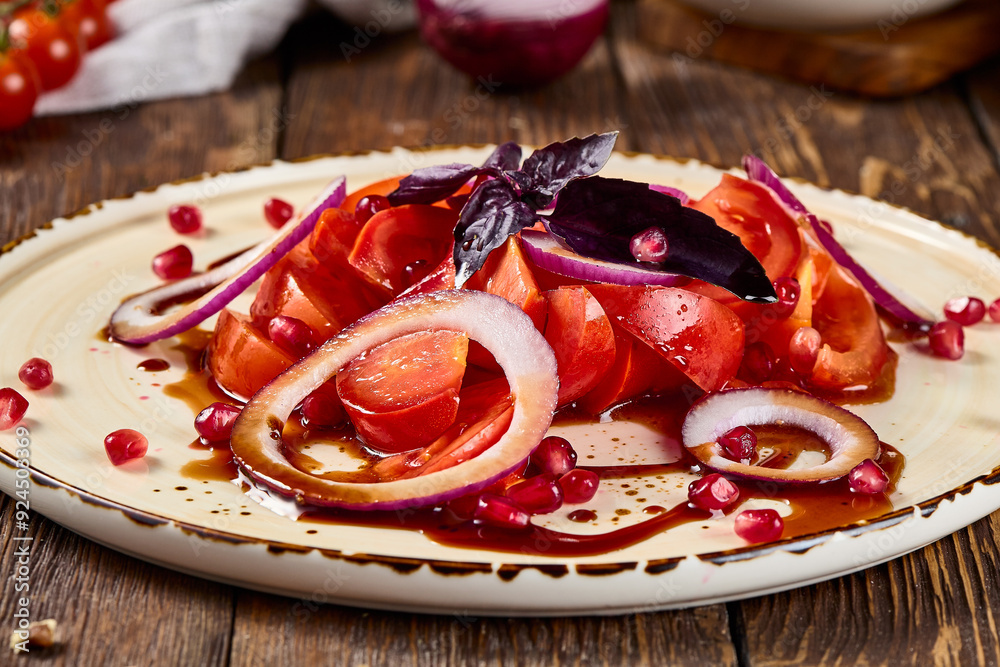 Fresh Tomato Salad with Red Onion and Pomegranate Narsharab Sauce on Rustic Plate Fresh Tomato Salad with Red Onion and Pomegranate Narsharab Sauce on Rustic Plate
