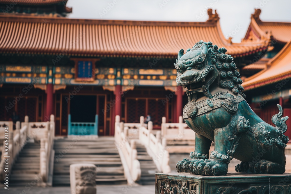 A majestic bronze lion statue standing in front of the Forbidden City, the symbolic building of China. China travel, culture, history, tradition concept. A majestic bronze lion statue standing in front of the Forbidden City, the symbolic building of China. China travel, culture, history, tradition concept.