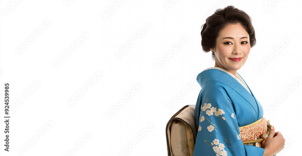 A woman in a blue kimono is smiling and holding a purse A woman in a blue kimono is smiling and holding a purse