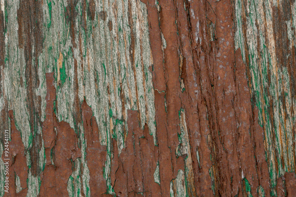 Obraz premium Zniszczona stara drewniana deska, farba łuszcząca się na drewnie