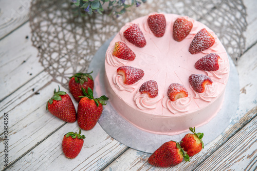 strawberry cake on a wooden table