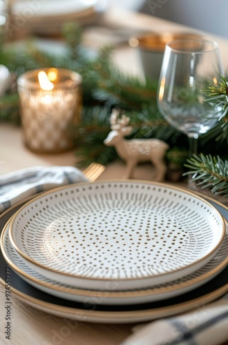 Beautifully Set Table for a Festive Dinner With Candles and Holiday Decor