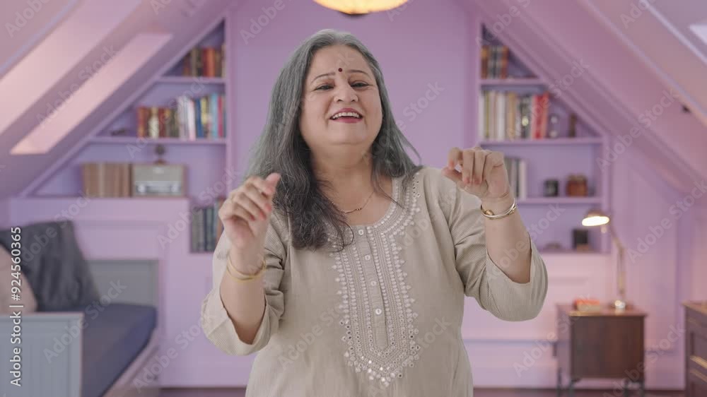 Happy Indian old woman dancing and enjoying Happy Indian old woman dancing and enjoying