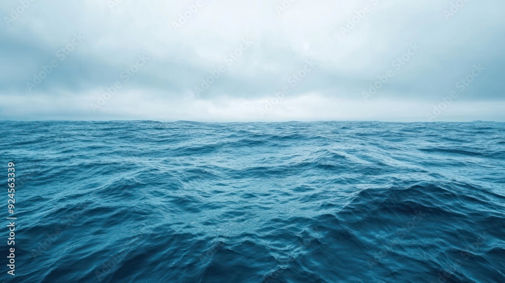Distant View of Rippling Ocean Waters Under Cloudy Sky Distant View of Rippling Ocean Waters Under Cloudy Sky