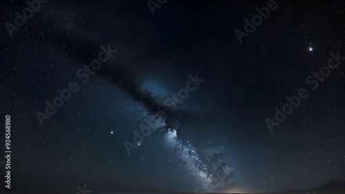 Galaxy Illuminates the Night Sky Over Distant Horizons