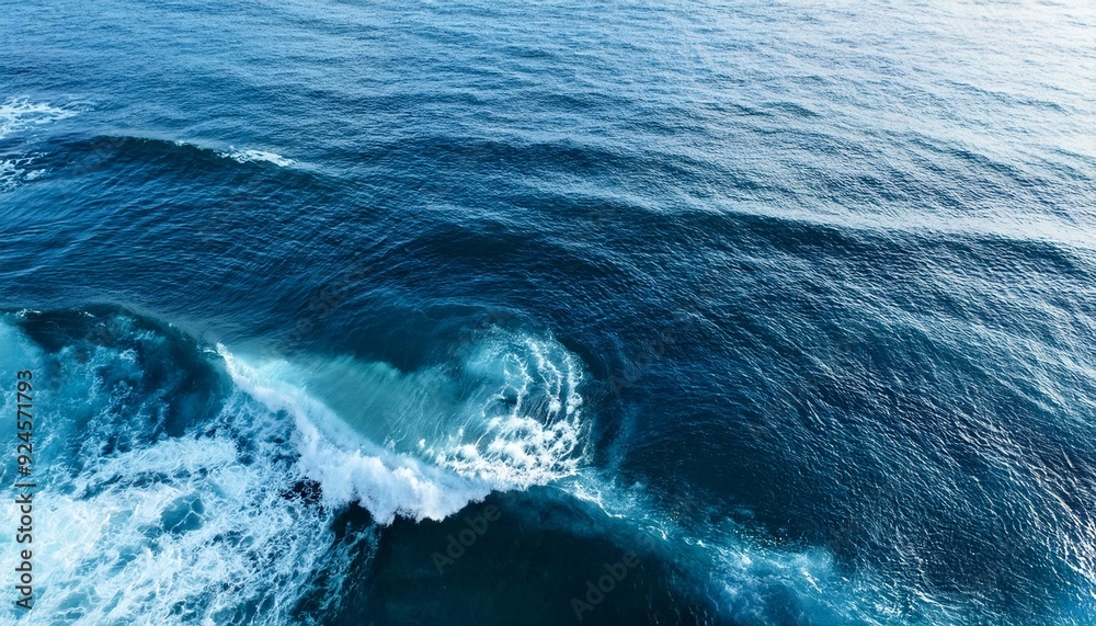 Fototapeta premium Top view on blue ocean waves. Nature background,, water, ocean, wave, waves, nature, boat, surf, beach, foam, storm, summer, splash, blue, coast