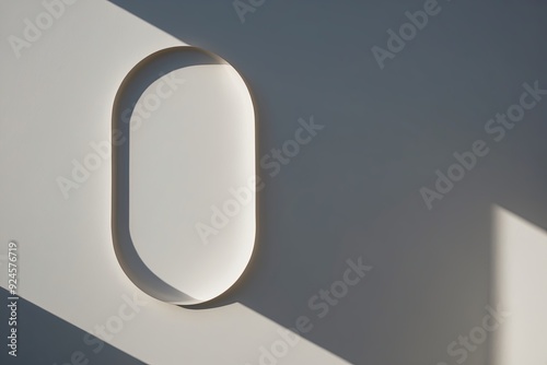 Soft-spoken Shadow Oval Contour Cast on Bright Backdrop