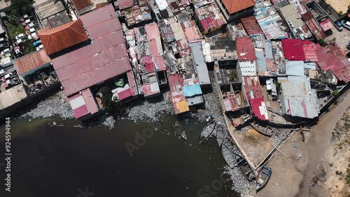 Top down view of slums in Luanda, Angola showing crowded housing and waterways photo