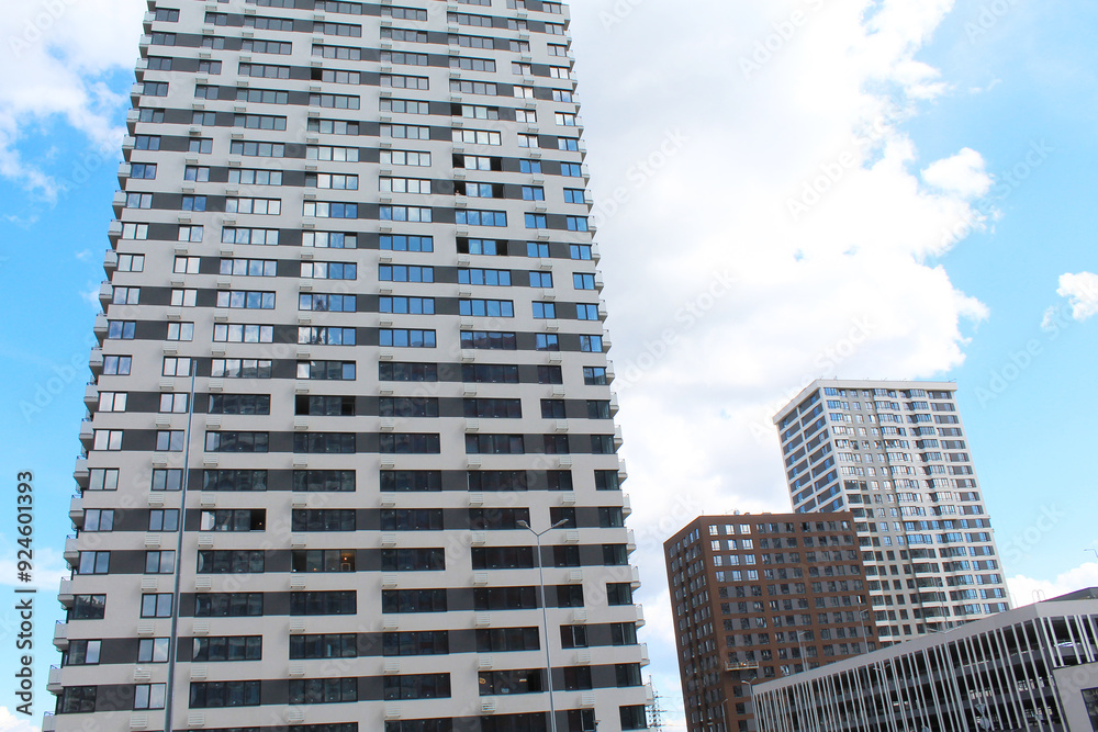 Fototapeta premium modern apartment building in the city, office building with sky, modern office building in downtown