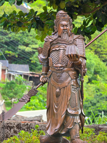 Kwan Kung, the bronze statue of Kwan Sheng Di Jun, who is also the god of many industries. photo