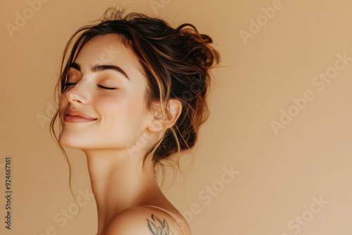 A close up of a woman's face with tattoos and her eyes closed