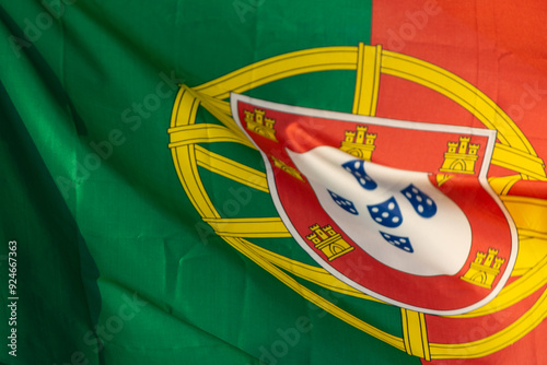 close up view of the flag of Portugal fluttering in the wind
