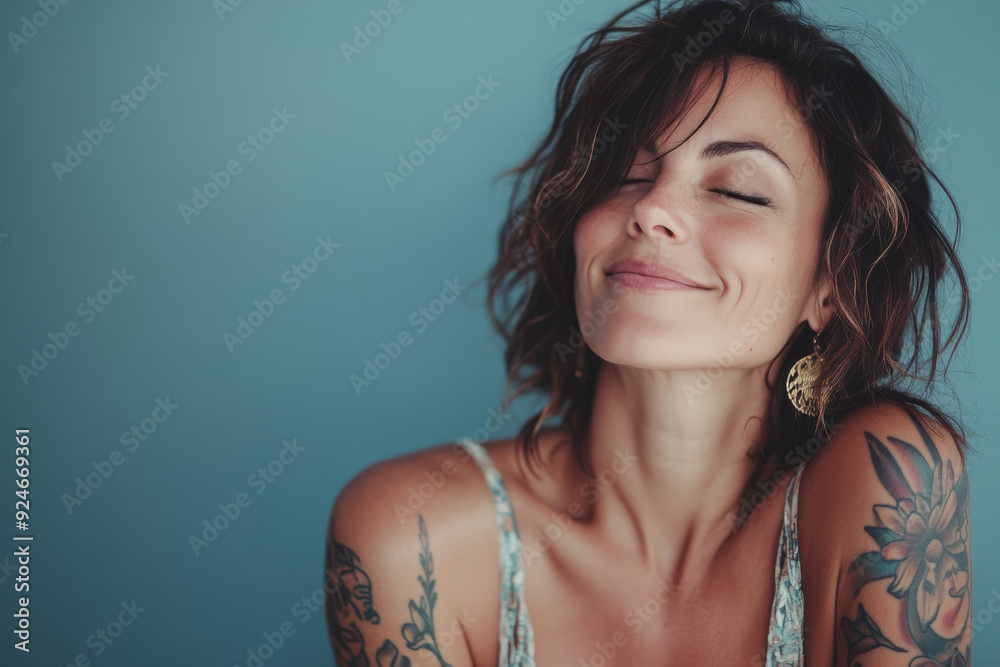A close up of a woman's face with tattoos and her eyes closed A close up of a woman's face with tattoos and her eyes closed