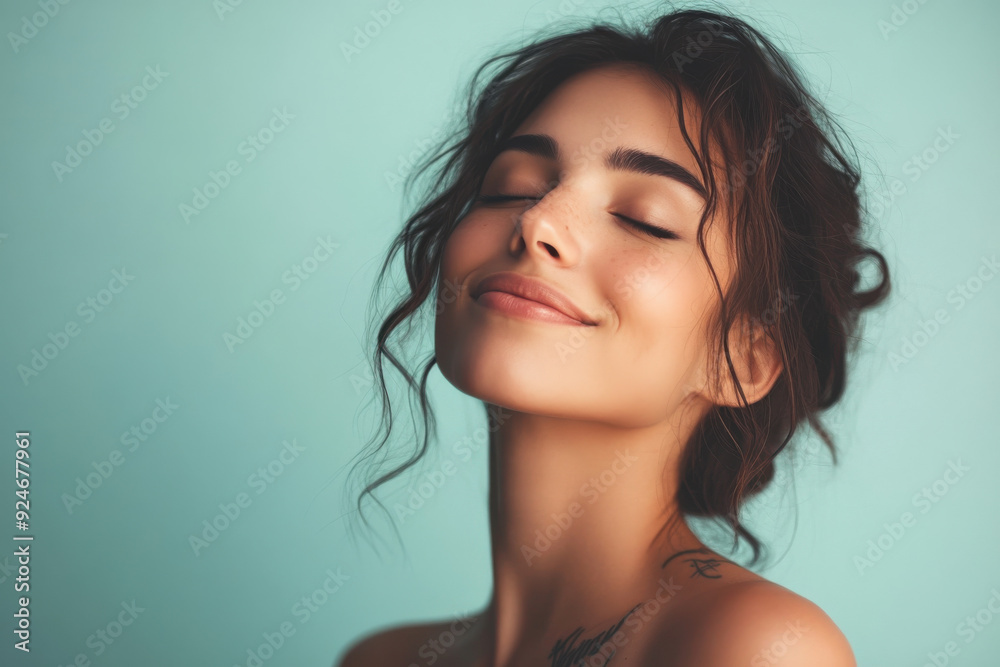 A close up of a woman's face with tattoos and her eyes closed A close up of a woman's face with tattoos and her eyes closed