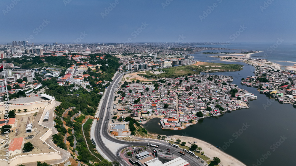 Fototapeta premium Aerial view of Luanda showcasing urban landscape and coastline in Angola