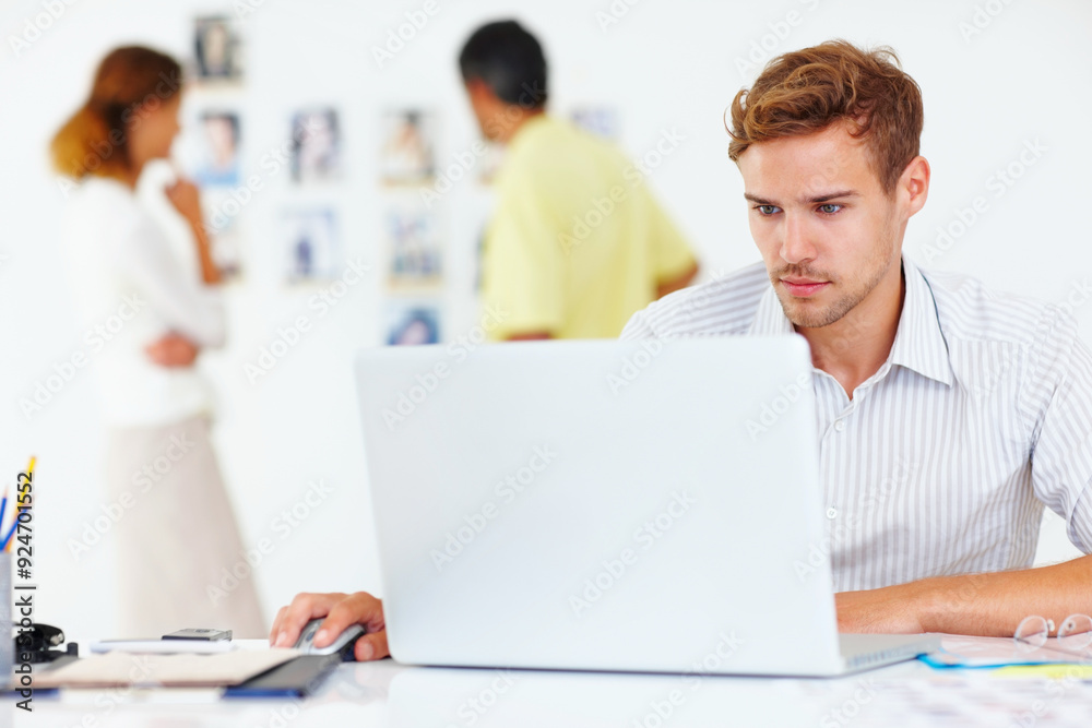 Laptop, creative and man in office for editing pictures at magazine agency for publishing. Computer, career and male photographer working online for newsletter by desk with technology at workplace. Laptop, creative and man in office for editing pictures at magazine agency for publishing. Computer, career and male photographer working online for newsletter by desk with technology at workplace.