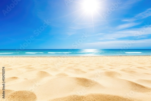 sand on the beach with a blue sky photo