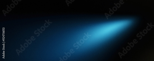 Abstract blue spotlight on a black background banner with empty space for text.