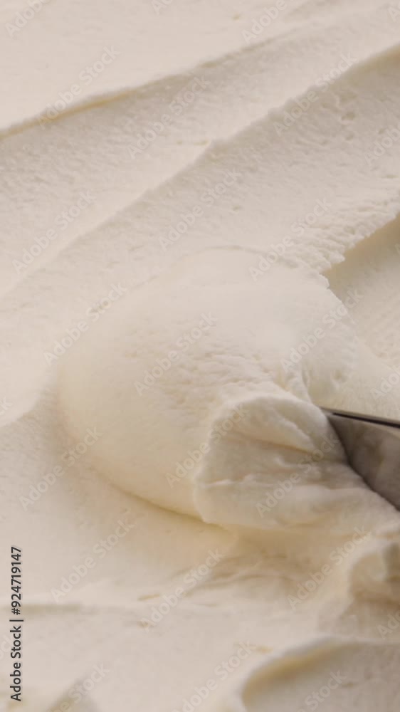 Smoothing cream cheese with a knife. Preparing an assortment of dishes using cream cheese, mascarpone, or cottage cheese. Vertical video Smoothing cream cheese with a knife. Preparing an assortment of dishes using cream cheese, mascarpone, or cottage cheese. Vertical video