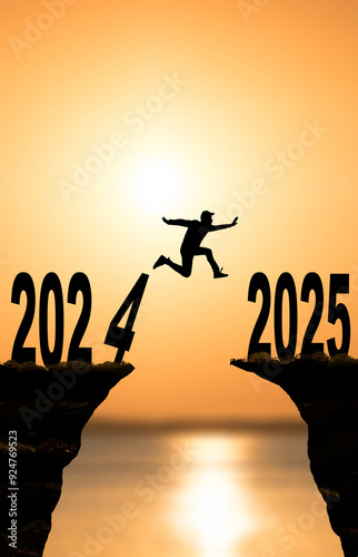 2025 year concept. Silhouettes of active people in nature against the backdrop of sunset and the numbers 2025