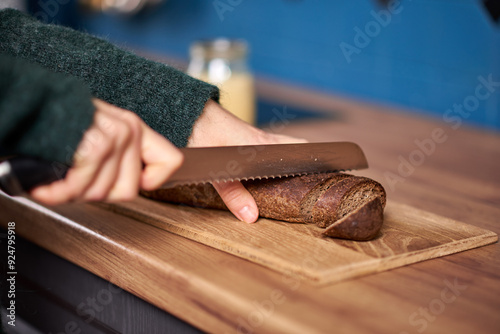 Women cut bread