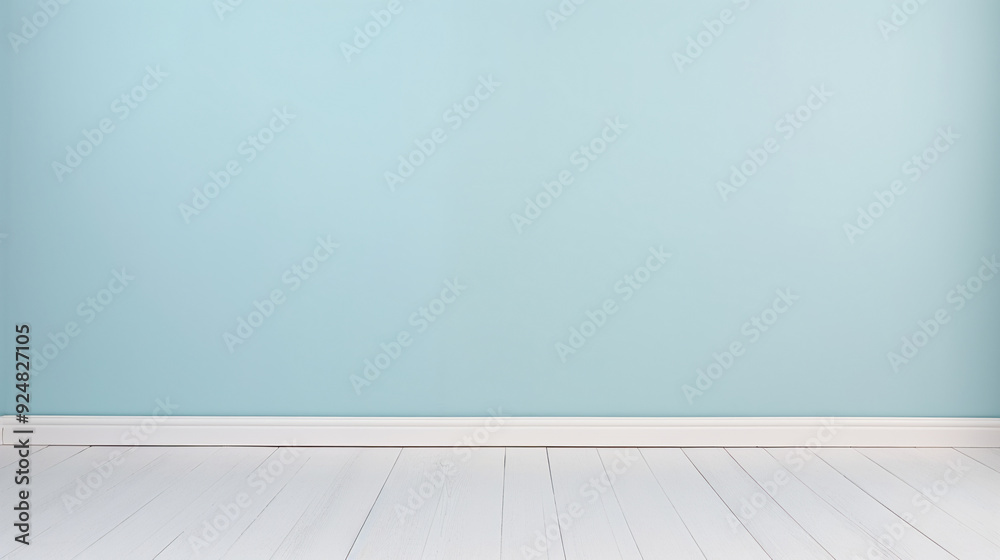 A plain light blue wall with a white wooden floor, ideal for product photography.background, backdrop.
