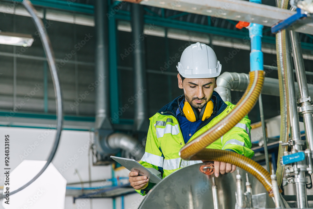 Industrial factory worker, Engineer staff working in food and drinks factory, Control check quality condition of liquid pipe supply in plant. Industrial factory worker, Engineer staff working in food and drinks factory, Control check quality condition of liquid pipe supply in plant.