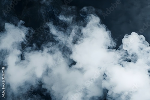 A cloud of smoke is billowing out of a pipe