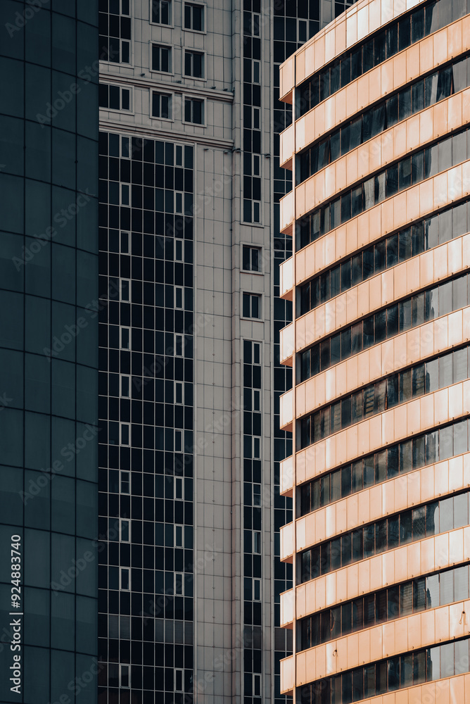 many windows and walls facade of a modern skyscraper without people many windows and walls facade of a modern skyscraper without people