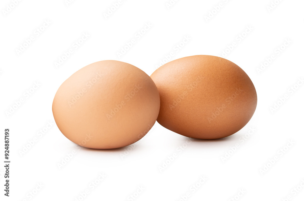 Two fresh brown chicken eggs in stack isolated on white background Two fresh brown chicken eggs in stack isolated on white background