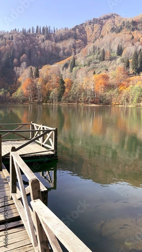 Karagöl, Borçka, Artvin, Turkey - 14 October 2021. Autumn view from Karagöl in Borçka district of Artvin province. Borcka Karagol Nature Park. The forest scene reflected in the still lake.