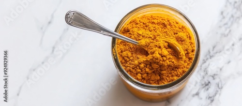 Curry powder in a glass wit...