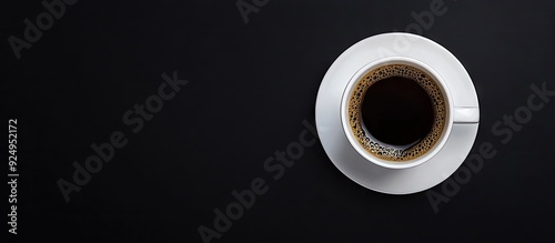 White cup filled with black...