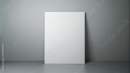 Empty white poster screen with a blank space, isolated on a grey background, awaits your message, image, or design to be displayed perfectly.