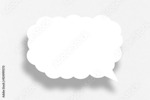 Empty white cloud paper speech bubble shape against white background.