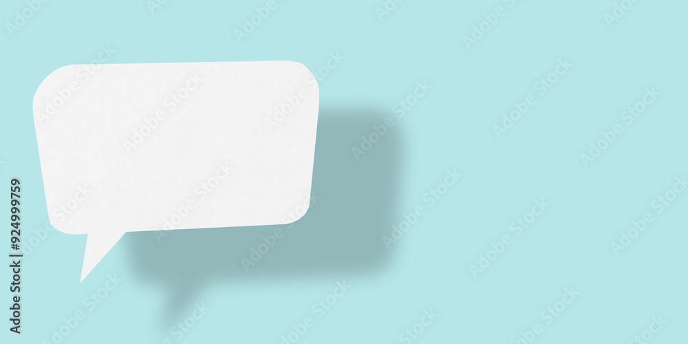 Empty speech balloon shape white paper isolated on light blue background communication bubbles. Empty speech balloon shape white paper isolated on light blue background communication bubbles.