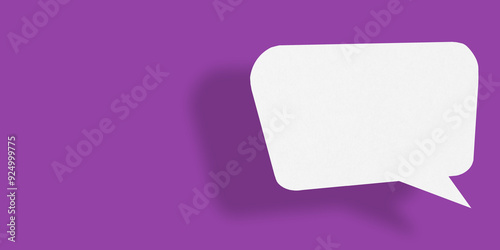 Empty speech balloon shape white paper isolated on purple background communication bubbles.