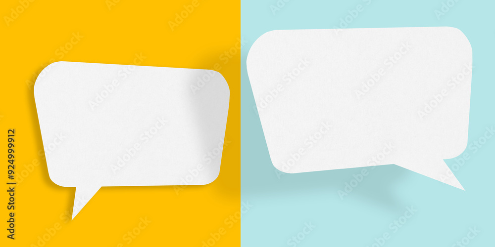 Empty speech balloon shape white paper isolated on yellow-light blue background communication bubbles. Empty speech balloon shape white paper isolated on yellow-light blue background communication bubbles.