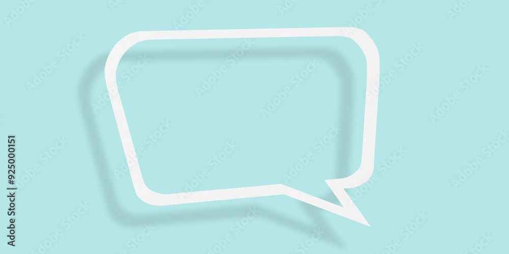 Empty transparent balloon paper speech bubble shape against light blue background. Empty transparent balloon paper speech bubble shape against light blue background.