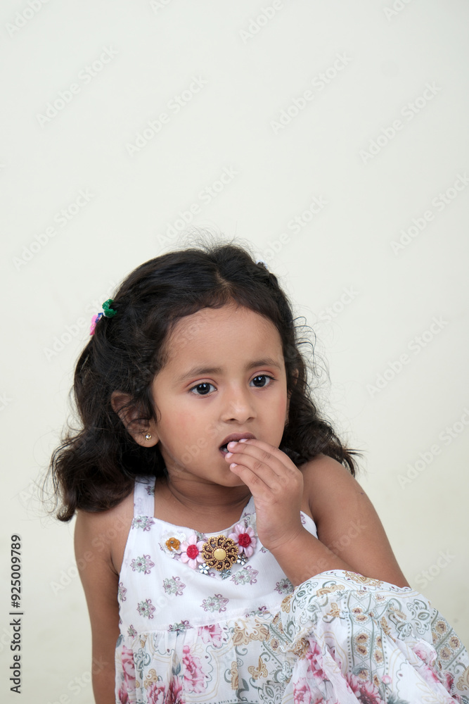 A delightful little girl with sparkling eyes, breaking into a wide, infectious smile. Her expression radiates pure happiness and innocence. A delightful little girl with sparkling eyes, breaking into a wide, infectious smile. Her expression radiates pure happiness and innocence.