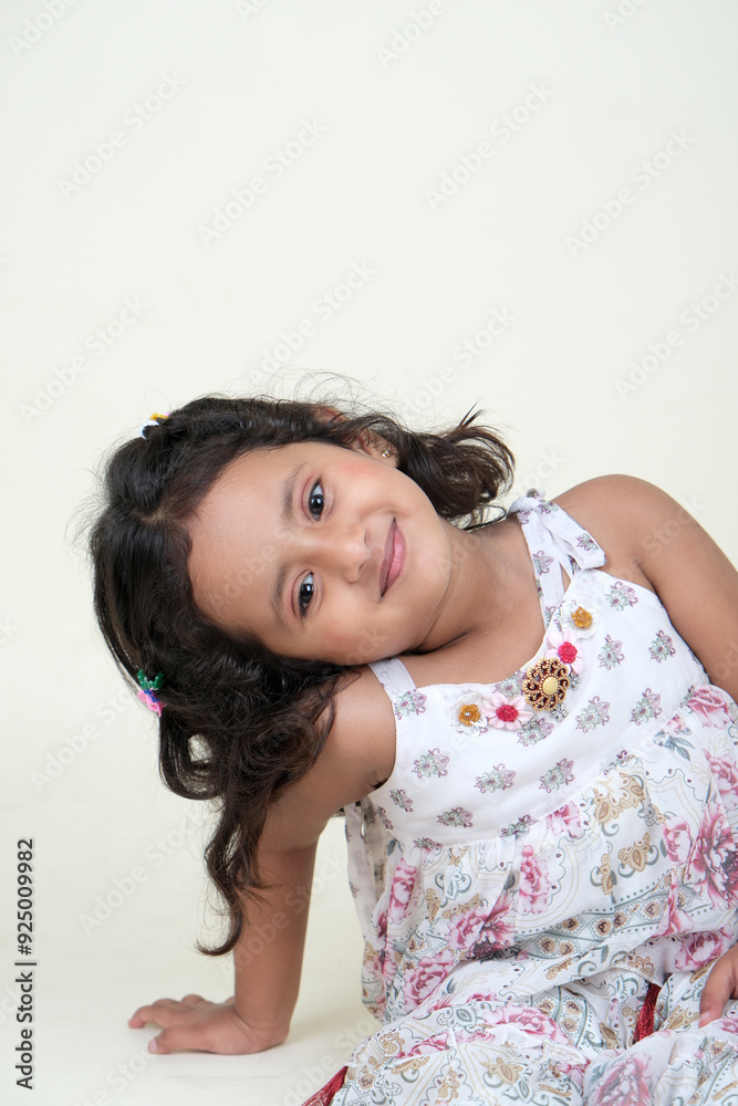 A delightful little girl with sparkling eyes, breaking into a wide, infectious smile. Her expression radiates pure happiness and innocence. A delightful little girl with sparkling eyes, breaking into a wide, infectious smile. Her expression radiates pure happiness and innocence.