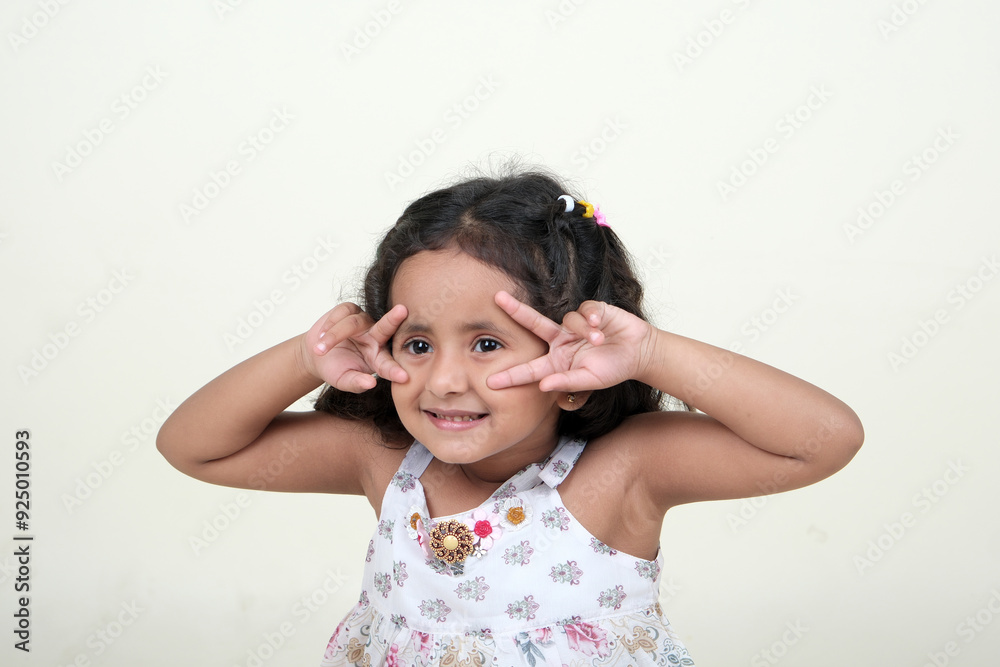 A delightful little girl with sparkling eyes, breaking into a wide, infectious smile. Her expression radiates pure happiness and innocence. A delightful little girl with sparkling eyes, breaking into a wide, infectious smile. Her expression radiates pure happiness and innocence.